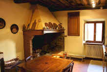 Traditional kitchen in a Volpaia house